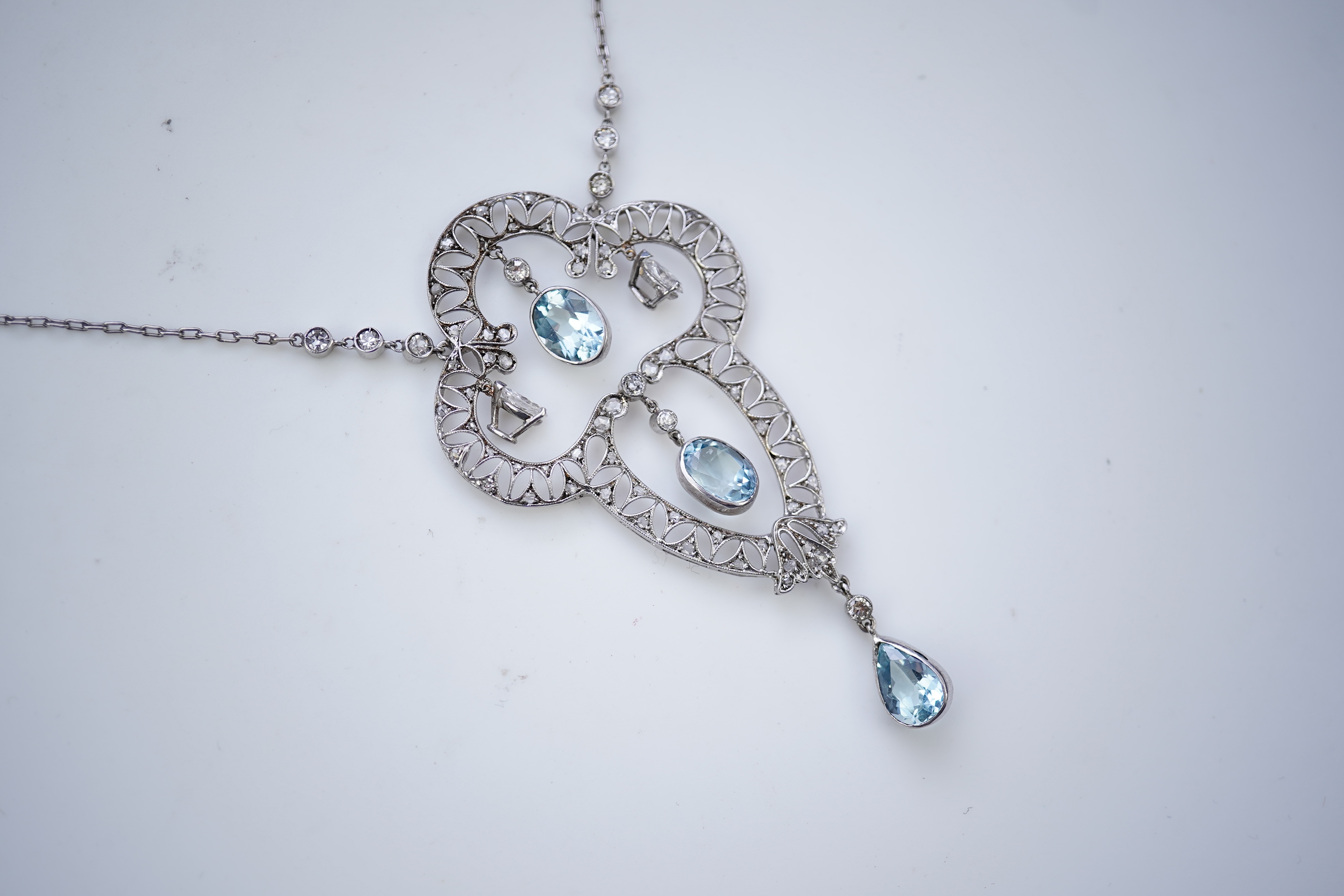 An Edwardian aquamarine and diamond pendant, circa 1910